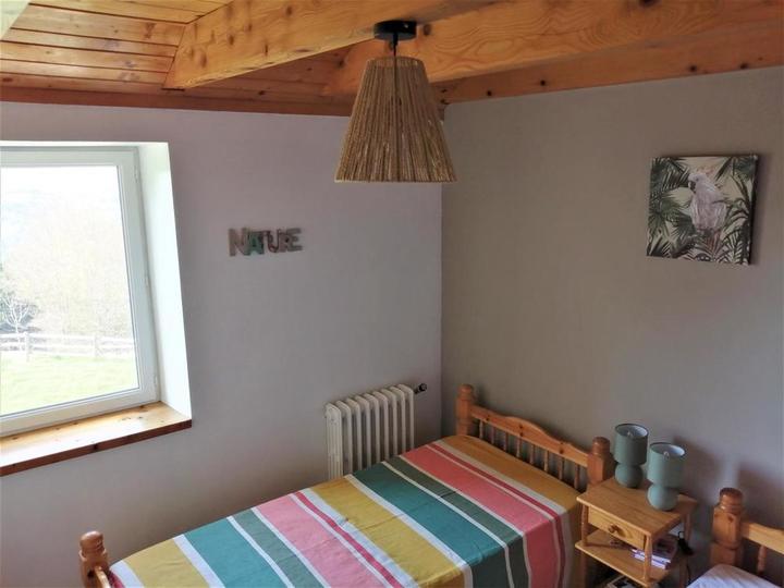 Chambre avec 2 lits à l'étage