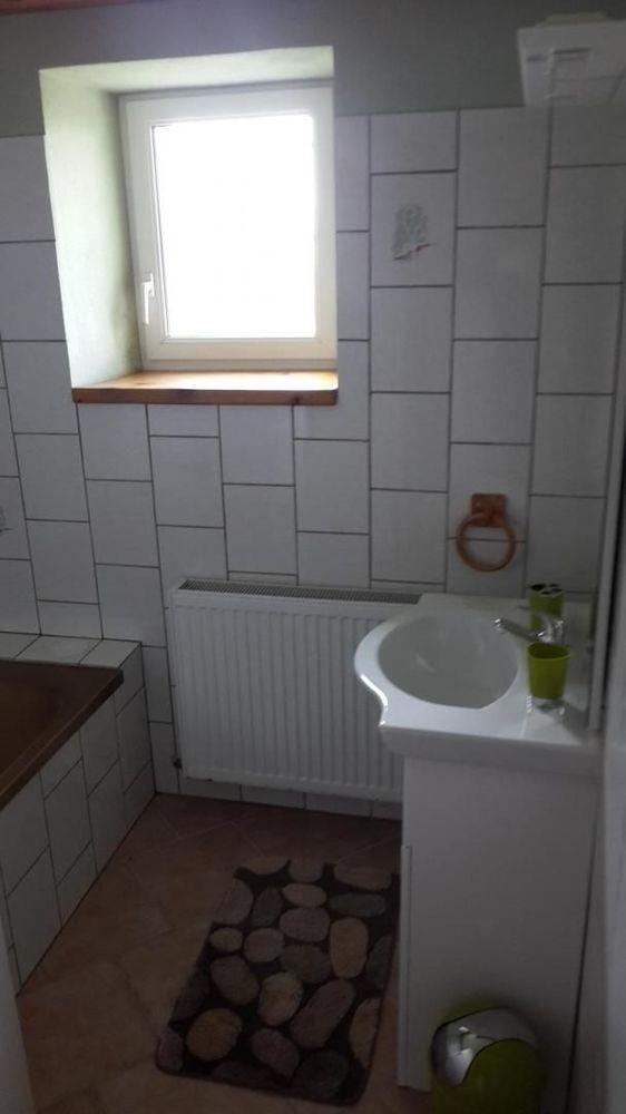 Entrée Salle de bains avec baignoire